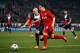 PARIS, FRANCE - MARCH 12: Christophe Jallet of Paris Saint-Germain chases Andres Guardado of Bayer Leverkusen during the UEFA Champions League Round of 16 second leg match between Paris Saint-Germain FC and Bayer Leverkusen at Parc des Princes on March 1