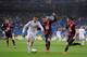 MADRID, SPAIN - MARCH 29: Cristiano Ronaldo (L) of Real Madrid FC is tackled by Saul Niguez of Rayo Vallecano de Madrid during the La Liga match between Real Madrid CF and Rayo Vallecano de Madrid at Santiago Bernabeu stadium on March 29, 2014 in Madrid,