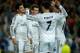 MADRID, SPAIN - MARCH 18: Alvaro Morata (L) of Real Madrid is congratulated by teammates after scoring his team's third goal during the UEFA Champions League Round of 16, second leg match between Real Madrid and FC Schalke 04 at Estadio Santiago Bernabeu