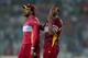 DHAKA, BANGLADESH - APRIL 01: Andre Russell of the West Indies celebrates with Chris Gayle after dismissing Mohammad Hafeez of Pakistan during the ICC World Twenty20 Bangladesh 2014 match between West Indies and Pakistan at Sher-e-Bangla Mirpur Stadium o