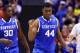 INDIANAPOLIS, IN - MARCH 28: Dakari Johnson #44 of the Kentucky Wildcats celebrates after scoring a basket and being fouled by Louisville Cardinals during the regional semifinal of the 2014 NCAA Men's Basketball Tournament at Lucas Oil Stadium on March 2