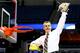 MEMPHIS, TN - MARCH 29: Head coach Billy Donovan of the Florida Gators cuts the net after defeating the Dayton Flyers 62-52 in the south regional final of the 2014 NCAA Men's Basketball Tournament at the FedExForum on March 29, 2014 in Memphis, Tennessee