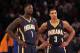 NEW YORK, NY - NOVEMBER 20: Lance Stephenson #1 and George Hill #3 of the Indiana Pacers wait for play to begin against the New York Knicks at Madison Square Garden on November 20, 2013 in New York City. NOTE TO USER: User expressly acknowledges and agree