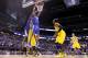 INDIANAPOLIS, IN - MARCH 30: Marcus Lee #00 of the Kentucky Wildcats dunks the ball against the Michigan Wolverines during the midwest regional final of the 2014 NCAA Men's Basketball Tournament at Lucas Oil Stadium on March 30, 2014 in Indianapolis, In