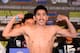 LOS ANGELES, CA - AUGUST 23: Leo Santa Cruz poses as he steps on the scale at 121.5 pounds before his fight against Victor Terrazas during the weigh in at the Millennium Biltmore Hotel on August 23, 2013 in Los Angeles, California. (Photo by Harry How/G
