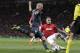 Alexander Buttner challenges Arjen Robben at the corner flag.
