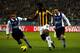 ARNHEM, NETHERLANDS - DECEMBER 19: Wilfried Bony of Vitesse and Edwin Dekkers (R) and Stefan van der Grijp (L) of ADO 20 battle for the ball during the KNVB Dutch Cup match between Vitesse Arnhem and ADO 20 at Gelredome on December 19, 2012 in Arnhem, Ne