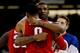 NEW ORLEANS, LA - MARCH 31: Jared Sullinger #0 of the Ohio State Buckeyes hugs Thomas Robinson #0 of the Kansas Jayhawks after losing 64-62 in the National Semifinal game of the 2012 NCAA Division I Men's Basketball Championship at the Mercedes-Benz Supe