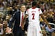 ATLANTA, GA - APRIL 06: Head coach Rick Pitino of the Louisville Cardinals talks with Russ Smith #2 in the second half against the Wichita State Shockers during the 2013 NCAA Men's Final Four Semifinal at the Georgia Dome on April 6, 2013 in Atlanta, Geo