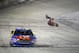 BRISTOL, TN - MARCH 16: Carl Edwards, driver of the #99 Kellogg's/Frosted Flakes Ford, celebrates with a backflip after winning the NASCAR Sprint Cup Series Food City 500 at Bristol Motor Speedway on March 16, 2014 in Bristol, Tennessee. (Photo by Jonat
