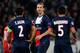 PARIS, FRANCE - MARCH 12: Zlatan Ibrahimovic (C) of PSG speaks to team mates Thiago Silva and Marquinhos during the UEFA Champions League Round of 16 second leg match between Paris Saint-Germain FC and Bayer Leverkusen at Parc des Princes on March 12, 20