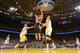 OAKLAND, CA - DECEMBER 19: Tiago Splitter #22 of the San Antonio Spurs flips up a shot against Andrew Bogut #12 of the Golden State Warriors on December 19, 2013 at Oracle Arena in Oakland, California. NOTE TO USER: User expressly acknowledges and agrees