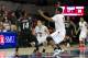 DALLAS, TX - FEBRUARY 8: Nic Moore #11 and Sterling Brown #3 of the SMU Mustangs trap Ge'Lawn Guyn #14 the Cincinnati Bearcats on February 8, 2014 at Moody Coliseum in Dallas, Texas. (Photo by Cooper Neill/Getty Images)