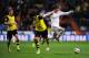 MADRID, SPAIN - APRIL 02: Gareth Bale of Real Madrid skips past Mats Hummels of Borussia Dortmund during the UEFA Champions League Quarter Final first leg match between Real Madrid and Borussia Dortmund at Estadio Santiago Bernabeu on April 2, 2014 in Mad