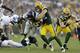 GREEN BAY, WI - AUGUST 23: Marshawn Lynch #24 of the Seattle Seahawks gets tackled by Clay Matthews #52 of the Green Bay Packers during a preseason game at Lambeau Field on August 23, 2013 in Green Bay, Wisconsin. (Photo by Mike McGinnis/Getty Images)