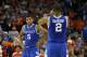 ATLANTA, GA - MARCH 16: Aaron Harrison #2 and Andrew Harrison #5 of the Kentucky Wildcats react in the second half against the Florida Gators during the Championship game of the 2014 Men's SEC Basketball Tournament at Georgia Dome on March 16, 2014 in At