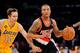 LOS ANGELES, CA - FEBRUARY 22: Damian Lillard #0 of the Portland Trail Blazers drives against Steve Nash #10 of the Los Angeles Lakers at Staples Center on February 22, 2013 in Los Angeles, California. NOTE TO USER: User expressly acknowledges and agrees