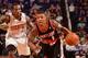 PHOENIX, AZ - OCTOBER 30: Damian Lillard #0 of the Portland Trailblazers drives against Eric Bledsoe #2 of the Phoenix Suns on October 30, 2013 at U.S. Airways Center in Phoenix, Arizona. NOTE TO USER: User expressly acknowledges and agrees that, by downl