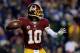 LANDOVER, MD - DECEMBER 01: Robert Griffin III #10 of the Washington Redskins throws a pass in the first half of an NFL game against the New York Giants at FedExField on December 1, 2013 in Landover, Maryland. (Photo by Patrick McDermott/Getty Images)