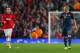 MANCHESTER, ENGLAND - APRIL 01: Bastian Schweinsteiger of Bayern Muenchen argues with Wayne Rooney of Manchester United after he received a red card during the UEFA Champions League Quarter Final first leg match between Manchester United and FC Bayern Mu