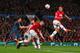 MANCHESTER, ENGLAND - APRIL 01: Nemanja Vidic of Manchester United heads in the first goal during the UEFA Champions League Quarter Final first leg match between Manchester United and FC Bayern Muenchen at Old Trafford on April 1, 2014 in Manchester, Eng