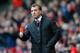 LIVERPOOL, ENGLAND - FEBRUARY 08: Liverpool Manager Brendan Rodgers gives a thumbs up during the Barclays Premier League match between Liverpool and Arsenal at Anfield on February 8, 2014 in Liverpool, England. (Photo by Michael Regan/Getty Images)