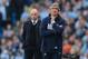 MANCHESTER, ENGLAND - MARCH 09: Wigan manager Uwe Rosler and Man City manager Manuel Pellegrini look on during the FA Cup Quarter-Final match between Manchester City and Wigan Athletic at the Etihad Stadium on March 9, 2014 in Manchester, England. (Photo