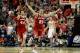 ANAHEIM, CA - MARCH 29: Josh Gasser #21 and Frank Kaminsky #44 of the Wisconsin Badgers celebrate after defeating the Arizona Wildcats 64-63 in overtime during the West Regional Final of the 2014 NCAA Men's Basketball Tournament at the Honda Center on Ma