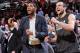 PORTLAND, OR - FEBRUARY 19: Tim Duncan #21 and Manu Ginobili #20 of the San Antonio Spurs react to a play on the bench against the Portland Trail Blazers on February 19, 2014 at the Moda Center Arena in Portland, Oregon. NOTE TO USER: User expressly ackn