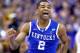ST LOUIS, MO - MARCH 23: Aaron Harrison #2 of the Kentucky Wildcats celebrates after defeating the Wichita State Shockers 78 to 76 during the third round of the 2014 NCAA Men's Basketball Tournament at Scottrade Center on March 23, 2014 in St Louis, Miss