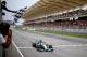 KUALA LUMPUR, MALAYSIA - MARCH 30: Lewis Hamilton of Great Britain and Mercedes GP takes the chequered flag as he is victorious during the Malaysia Formula One Grand Prix at the Sepang Circuit on March 30, 2014 in Kuala Lumpur, Malaysia. (Photo by Paul