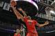 Welsh battles down low with Karl Towns of the East team.