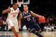 NEW YORK, NY - MARCH 28: Shabazz Napier #13 of the Connecticut Huskies handles the ball against Monte Morris #11 of the Iowa State Cyclones during the regional semifinal of the 2014 NCAA Men's Basketball Tournament at Madison Square Garden on March 28, 2