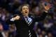 INDIANAPOLIS, IN - MARCH 30: Head coach John Calipari of the Kentucky Wildcats shouts to his players against the Michigan Wolverines during the midwest regional final of the 2014 NCAA Men's Basketball Tournament at Lucas Oil Stadium on March 30, 2014 in