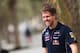 SAKHIR, BAHRAIN - APRIL 03: Sebastian Vettel of Germany and Infiniti Red Bull Racing walks in the paddock during previews for the Bahrain Formula One Grand Prix at the Bahrain International Circuit on April 3, 2014 in Sakhir, Bahrain. (Photo by Mark Tho