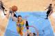 DENVER, CO - MARCH 28: Timofey Mozgov #25 of the Denver Nuggets dunks the ball against the San Antonio Spurs on March 28, 2014 at the Pepsi Center in Denver, Colorado. NOTE TO USER: User expressly acknowledges and agrees that, by downloading and/or using