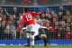 MANCHESTER, ENGLAND - APRIL 01: Danny Welbeck of Manchester United attempts to chip the goalkeeper Danny Welbeck of Bayern Muenchen during the UEFA Champions League Quarter Final first leg match between Manchester United and FC Bayern Muenchen at Old Tr