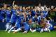 MUNICH, GERMANY - MAY 19: Chelsea players celebrate with the trophy after their victory in the UEFA Champions League Final between FC Bayern Muenchen and Chelsea at the Fussball Arena München on May 19, 2012 in Munich, Germany. (Photo by Laurence Griffi