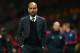 MANCHESTER, ENGLAND - APRIL 01: Pep Guardiola head coach of Bayern Muenchen at the end of match during the UEFA Champions League Quarter Final first leg match between Manchester United and FC Bayern Muenchen at Old Trafford on April 1, 2014 in Manchester