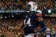 ATLANTA, GA - DECEMBER 07: Quarterback Nick Marshall #14 of the Auburn Tigers celebrates scoring a touchdown in the first quarter against the Missouri Tigers during the SEC Championship Game at Georgia Dome on December 7, 2013 in Atlanta, Georgia. (Phot