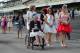 LIVERPOOL, ENGLAND - APRIL 04: Women arrive for Ladies Day at Aintree Racecourse on April 4, 2014 in Liverpool, England. (Photo by Laurence Griffiths/Getty Images)