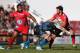 TOULON, FRANCE - DECEMBER 14: Maxime Mermoz (R) of Toulon is tackled by Tom Johnson of Exeter Chiefs during the Heineken Cup Pool Two match between Toulon and Exeter Chiefs at the Felix Mayol Stadium on December 14, 2013 in Toulon, France. (Photo by Mich