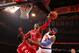NEW YORK, NY - NOVEMBER 14: Dwight Howard #12 of the Houston Rockets blocks a shot against Carmelo Anthony #7 of the New York Knicks during a game at Madison Square Garden in New York City on November 14, 2013. NOTE TO USER: User expressly acknowledges a