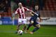 STOKE ON TRENT, ENGLAND - DECEMBER 18: Stephen Ireland of Stoke City competes with Jonny Evans of Manchester United during the Capital One Cup Quarter Final match between Stoke City and Manchester United at the Britannia Stadium on December 18, 2013 in S