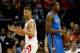 HOUSTON, TX - APRIL 04: Chandler Parsons #25 of the Houston Rockets reacts after a play against Kevin Durant #35 of the Oklahoma City Thunder during a game at the Toyota Center on April 4, 2014 in Houston, Texas. NOTE TO USER: User expressly acknowledges