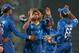 DHAKA, BANGLADESH - APRIL 03: Lasith Malinga of Sri Lanka is congratulated by his teammates after dismissing Dwayne Smith of of the West Indies during the ICC World Twenty20 Bangladesh 2014 1st Semi-Final match between Sri Lanka and the West Indies at Sh
