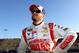 FONTANA, CA - MARCH 21: Dale Earnhardt Jr., driver of the #88 National Guard Chevrolet, stands on the grid during qualifying for the NASCAR Sprint Cup Series Auto Club 400 at Auto Club Speedway on March 21, 2014 in Fontana, California. (Photo by Jerry M