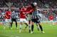 NEWCASTLE UPON TYNE, ENGLAND - APRIL 05: Chris Smalling and Marouane Fellaini of Manchester United put Luuk de Jong of Newcastle United under pressure during the Barclays Premier League match between Newcastle United and Manchester United at St James' Pa