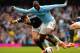MANCHESTER, ENGLAND - APRIL 05: Yaya Toure of Manchester City is challenged by Jose Fonte of Southampton during the Barclays Premier League match between Manchester City and Southampton at Etihad Stadium on April 5, 2014 in Manchester, England. (Photo b