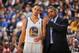 OAKLAND, CA - JANUARY 10: Head Coach Mark Jackson of the Golden State Warriors coaches player Stephen Curry #30 against the Boston Celtics on January 10, 2014 at Oracle Arena in Oakland, California. NOTE TO USER: User expressly acknowledges and agrees tha